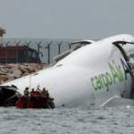 Two dead after cargo plane skids off Hong Kong runway into sea Two dead after cargo plane skids off Hong Kong runway into sea
