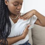 young-african-american-woman-palpating-her-breast-by-herself-that-she-concern-about-breast-cancer-healthcare-breast-cancer-concept-150x150.jpg