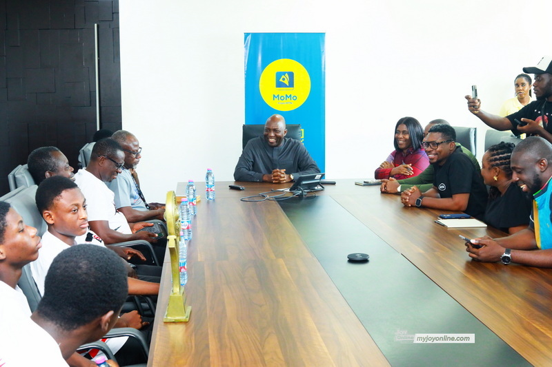 NSMQ 2025 Winners present trophy to CEO of MobileMoney Ltd NSMQ 2025 Winners present trophy to CEO of MobileMoney Ltd