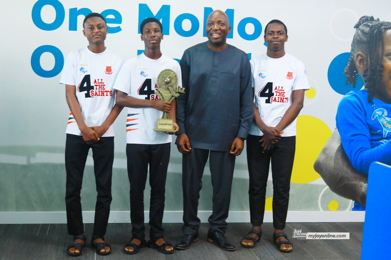 NSMQ 2025 Winners present trophy to CEO of MobileMoney Ltd NSMQ 2025 Winners present trophy to CEO of MobileMoney Ltd