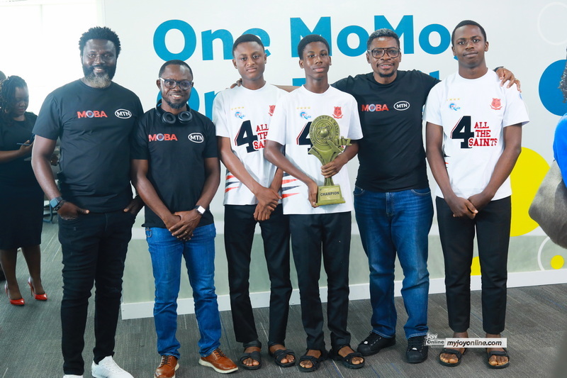 NSMQ 2025 Winners present trophy to CEO of MobileMoney Ltd NSMQ 2025 Winners present trophy to CEO of MobileMoney Ltd