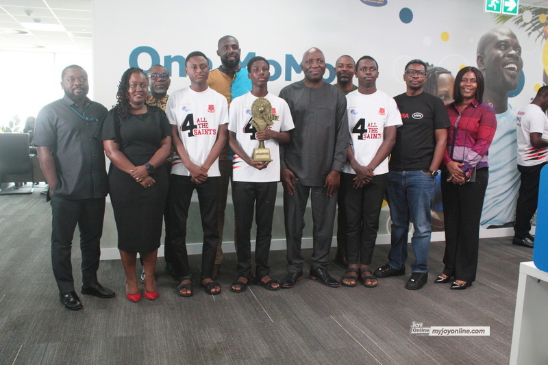 NSMQ 2025 Winners present trophy to CEO of MobileMoney Ltd NSMQ 2025 Winners present trophy to CEO of MobileMoney Ltd