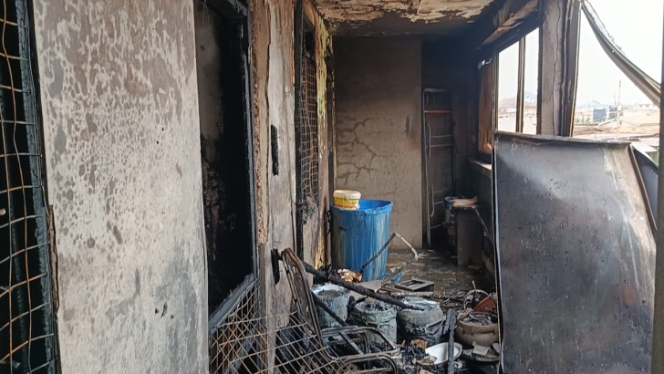 Fire Service contain fire at 14-room...