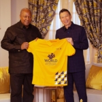 President Mahama admiring T- shirt for the World Assemblies of God, Congress.