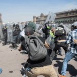 Thousands protest against government in Mexico as clashes leave 120 injured Thousands protest against government in Mexico as clashes leave 120 injured