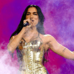 Warner settles lawsuit with AI music firm and launches joint venture