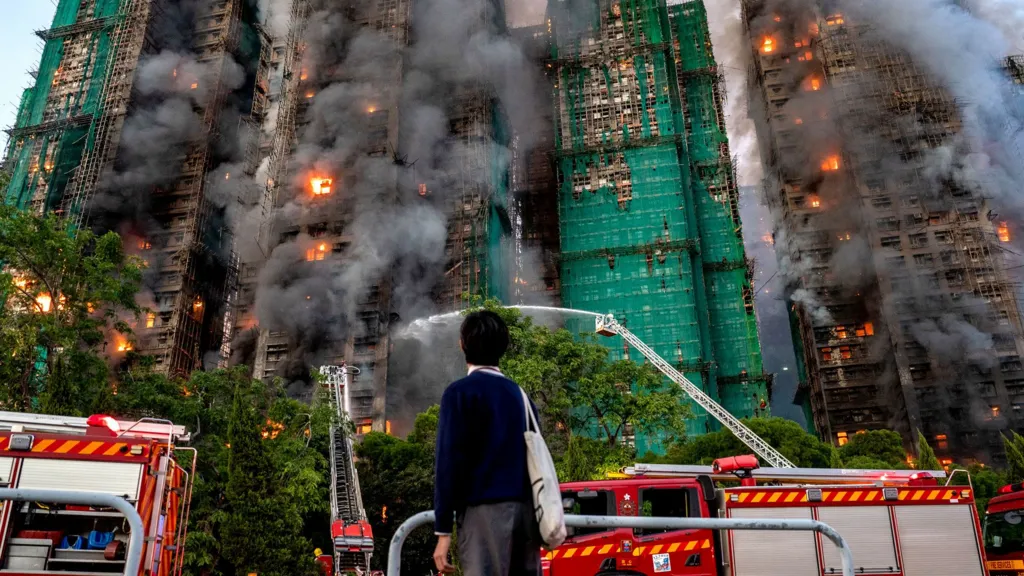 'Hang in there': Agonising wait for the missing after Hong Kong blaze 'Hang in there': Agonising wait for the missing after Hong Kong blaze