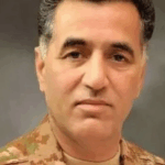 Pakistan's military sentences its former spy chief to 14 years in jail