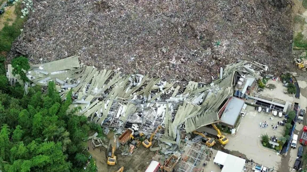One dead, dozens trapped after giant landfill collapses in Philippines