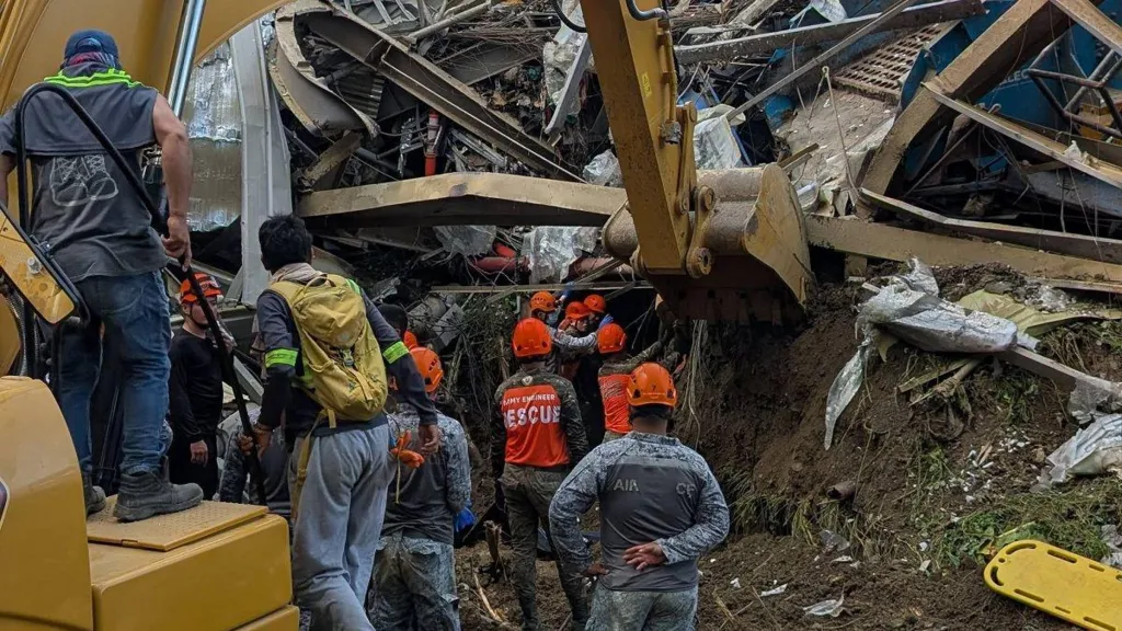One dead, dozens trapped after giant landfill collapses in Philippines