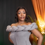 Behind the Lens with Queen Liz explores the enduring question: Who is God?