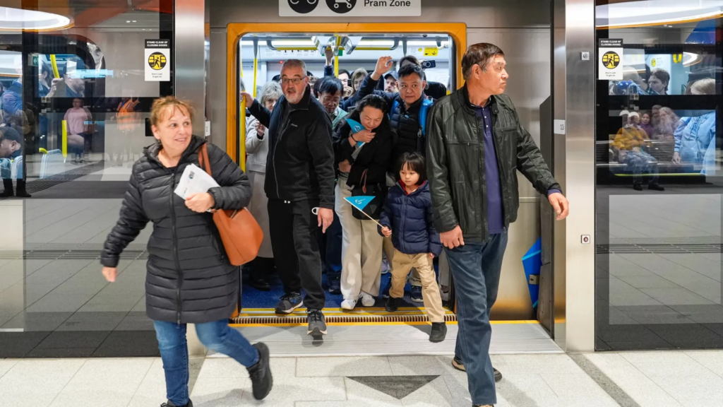Australia halves petrol tax and provides free public transport as war pushes up prices
