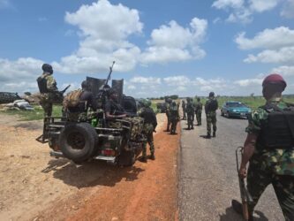 Wave of violence kills at least 26 in Nigeria as army thwarts mass church abduction