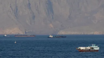 Strait of Hormuz closed again, Iran says, as ships attacked