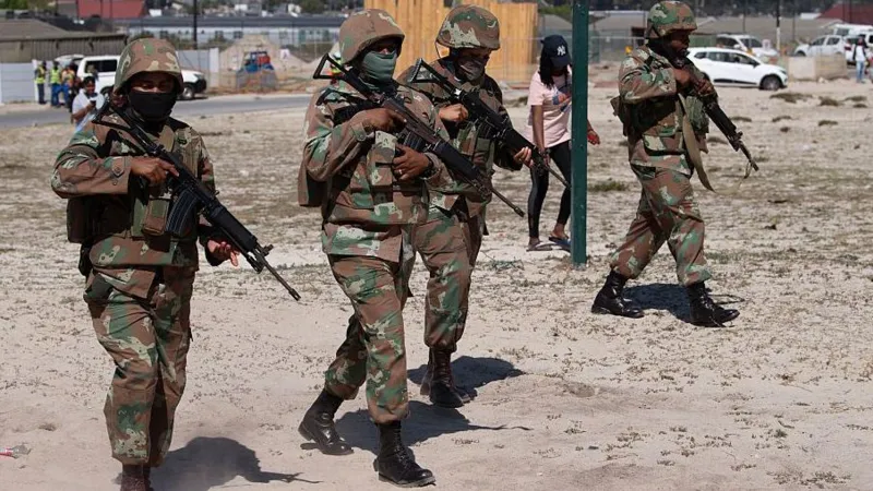 Soldiers patrol crime areas in South Africa to fight gangs