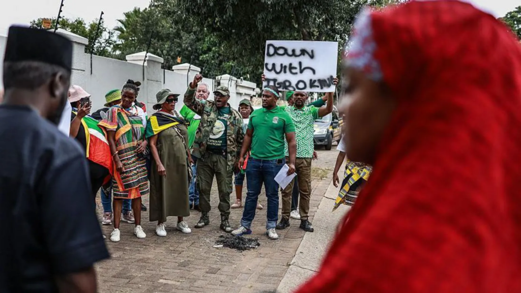 Nigeria warns its citizens in South Africa to be cautious after march turns violent