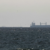 Iran says Strait of Hormuz is ‘open’ but tracking shows few ships moving