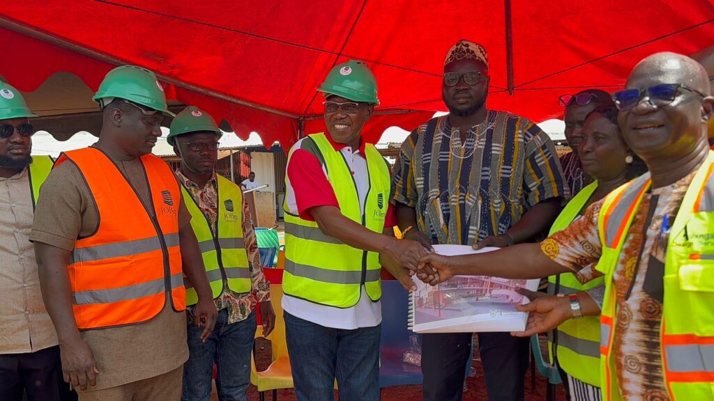 Dr. Apaak cuts sod for construction of...