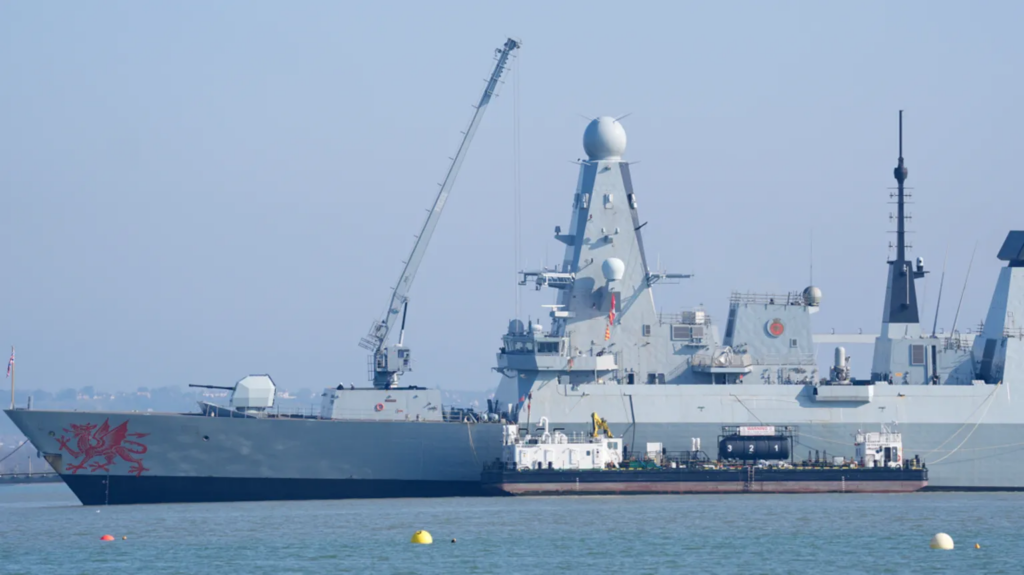 UK promises jets, drones and warship for...