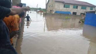 Photos: Heavy flooding leaves parts of Afienya submerged