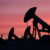 Oil inches down as investors focus on Hormuz flows after peace talks
