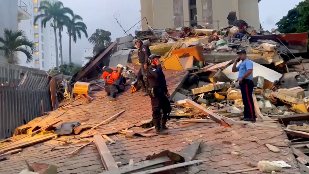 Buildings collapse as quakes rock...