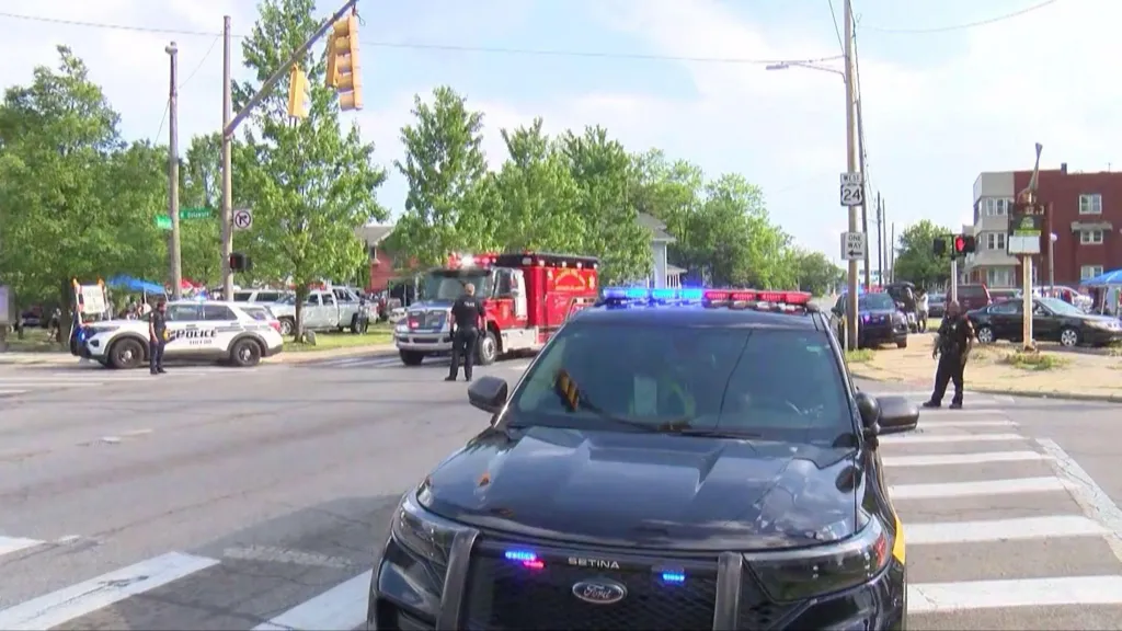 Manhunt for suspects after 12 people shot near festival in O