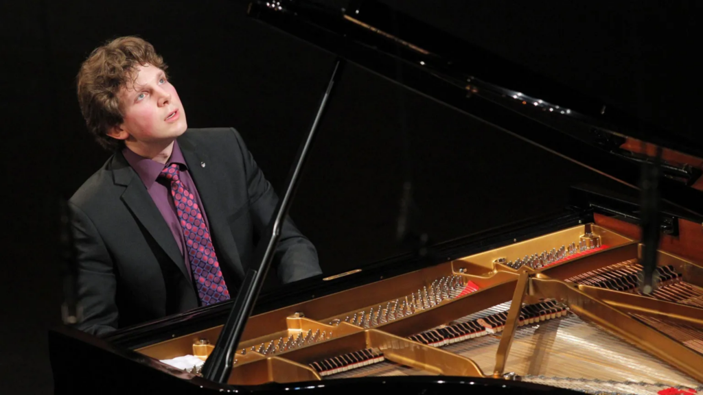 Judge urges Melbourne orchestra and pianist to resolve case 
