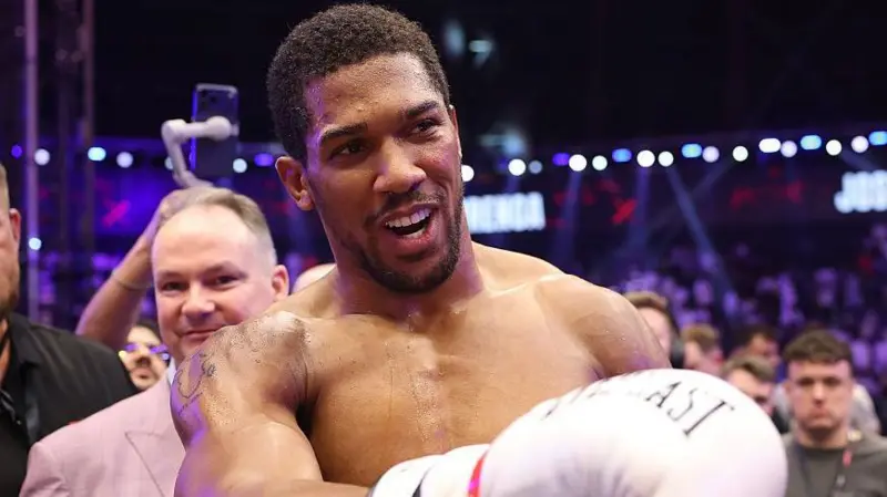 Joshua knocked down twice as dramatic win...