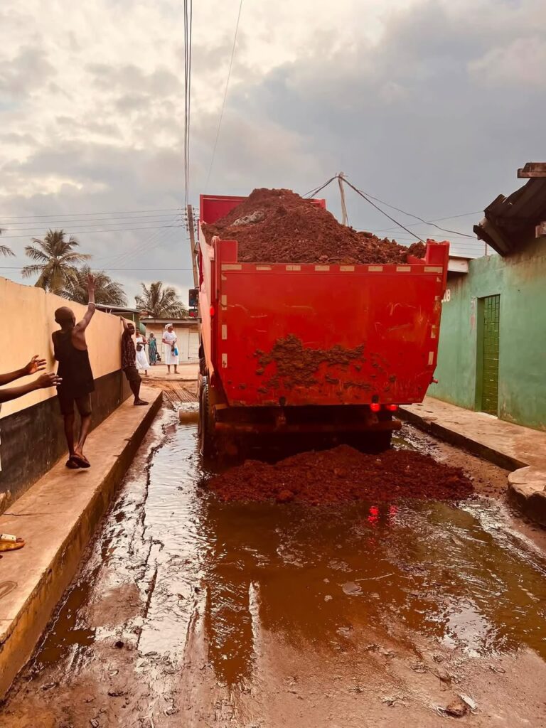 Flood-damaged Aflao Market road prompts...