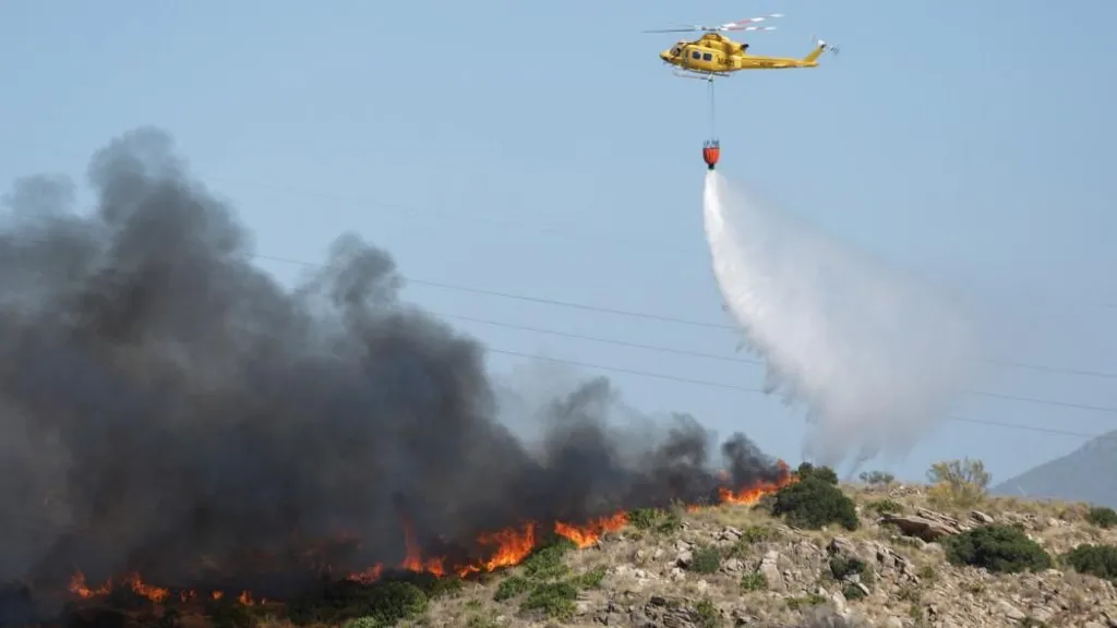 Spain battles to contain one of its...