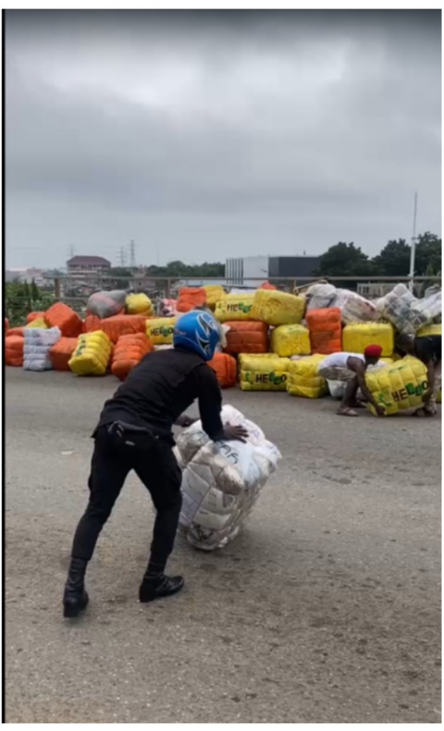 Driver, mate injured as truck carrying second-hand bales overturns at Alajo