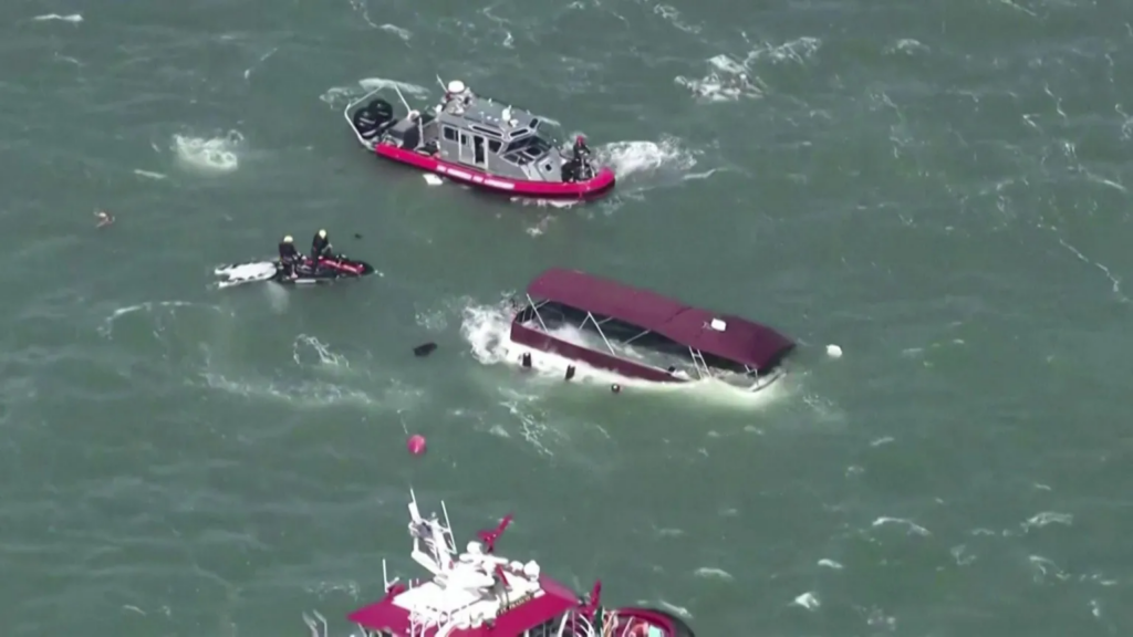 One dead and three missing after boat...