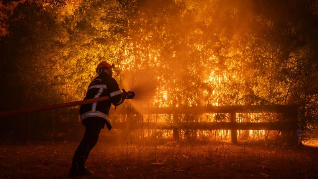 Macron calls crisis meeting as wildfires...