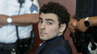 Mangione admits killing healthcare CEO and pleads guilty to federal charges