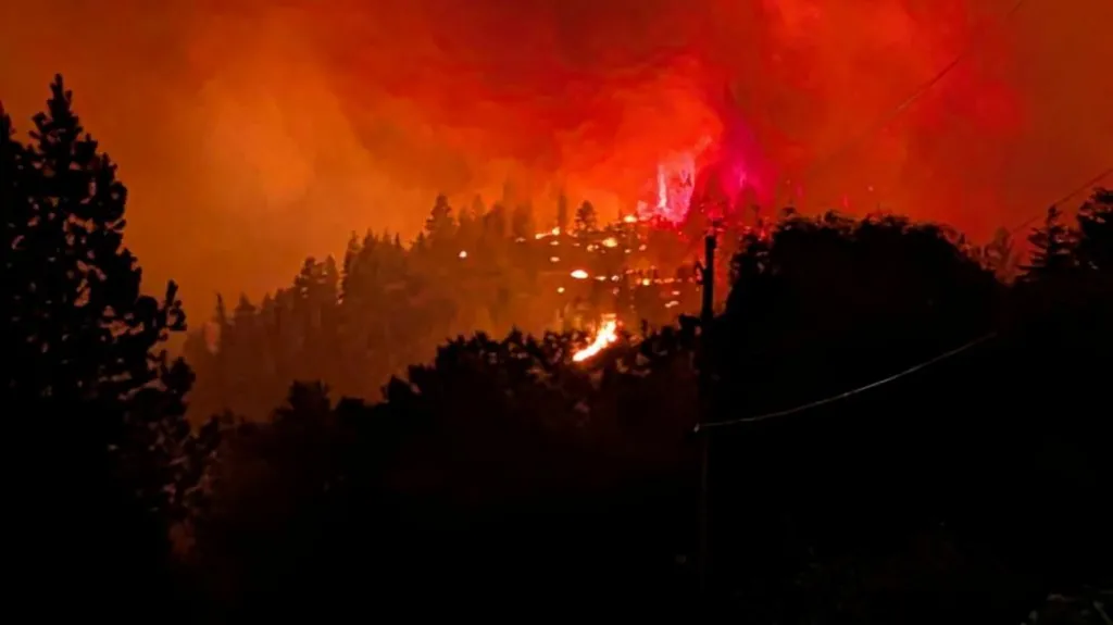 Fast-moving Canada wildfire doubles in...