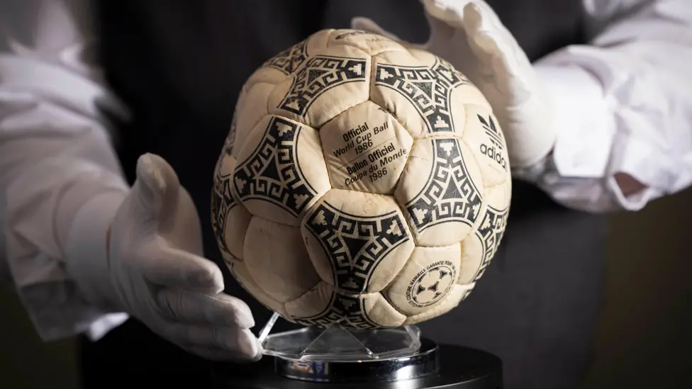 Maradona’s ‘Hand of God’ ball sells for...
