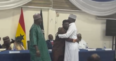 The handshake for peace: Chief Imam unites men at centre of religious controversy