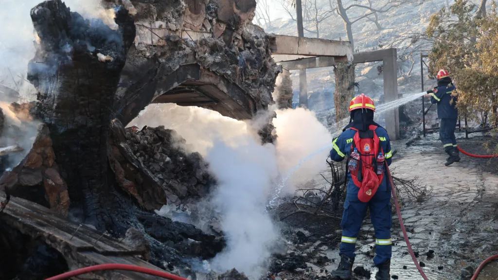 Two dead and hundreds evacuated as twin...