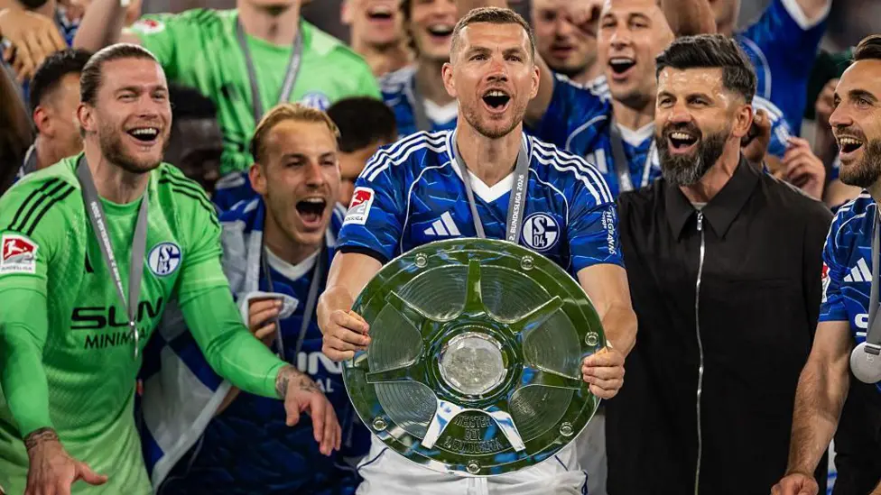 Ex-Man City striker Dzeko, 40, pens new...