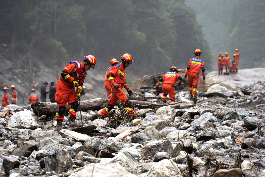Rescuers race to find thousands missing...