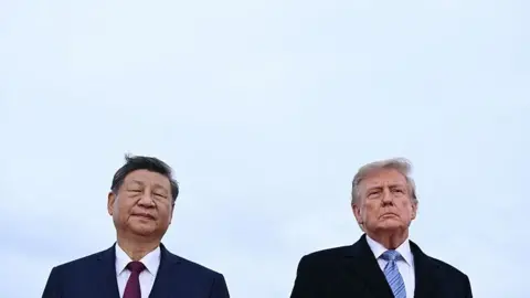 Getty Images US President Donald Trump right greets Chinese President Xi Jinping upon arrival at Joint Base Andrews in Maryland on 23 September 2026.