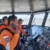 Indonesia rescuers battle turbulent seas in search for 129 people after passenger ship capsizes