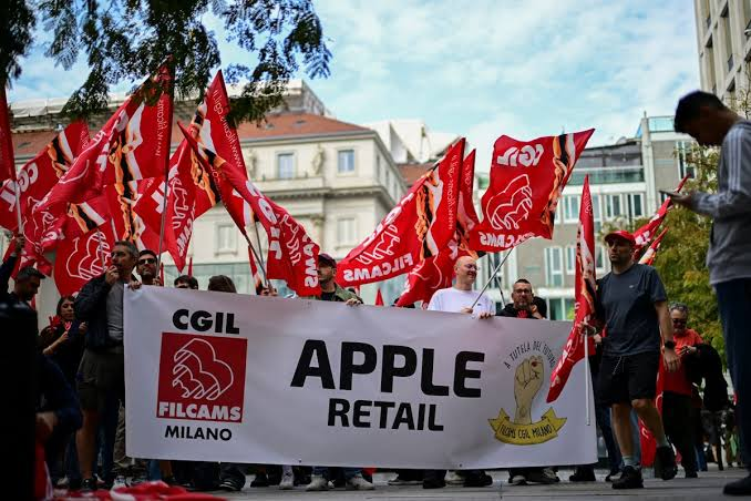 Italian Apple store employees strike on...