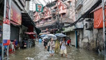 Bangkok roads submerged as flood disaster declared