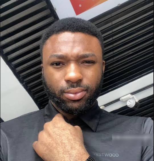 Suspect in murder of phone dealer...