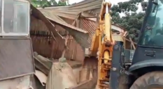Tension at Obuasi Rabb Junction as shop owners resist demolition exercise